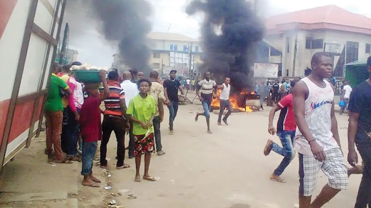 Mob burn two suspected motorcycle snatchers to death in Benue