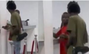 VIDEO: “This is m@dness” – Young man disrupts the peace inside banking hall as he plays song using his JBL speaker