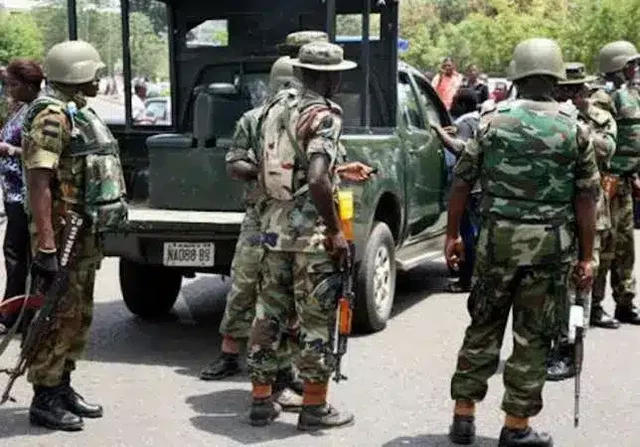 BREAKING: Armed soldiers face-off with Wike’s officials in gunfire-fueled Abuja demolition