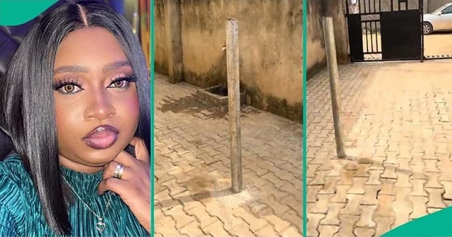 VIDEO: Tenant cries out as landlady allegedly erects 2 poles in compound to stop people from parking cars