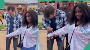 VIDEO: Lady claims her man came from America to attend her university sign-out ceremony