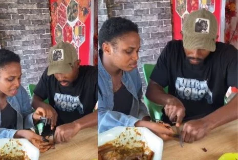 VIDEO: Man fumes as he cuts the long nails of his girlfriend who finds it hard to eat