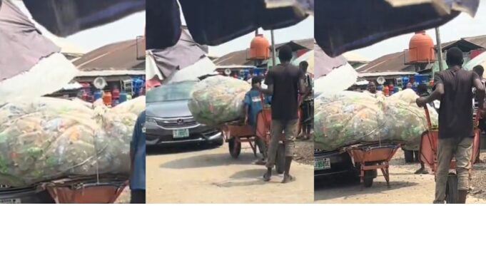 VIDEO: Drama after a wheelbarrow pusher blocks a car on a roadway at a local market