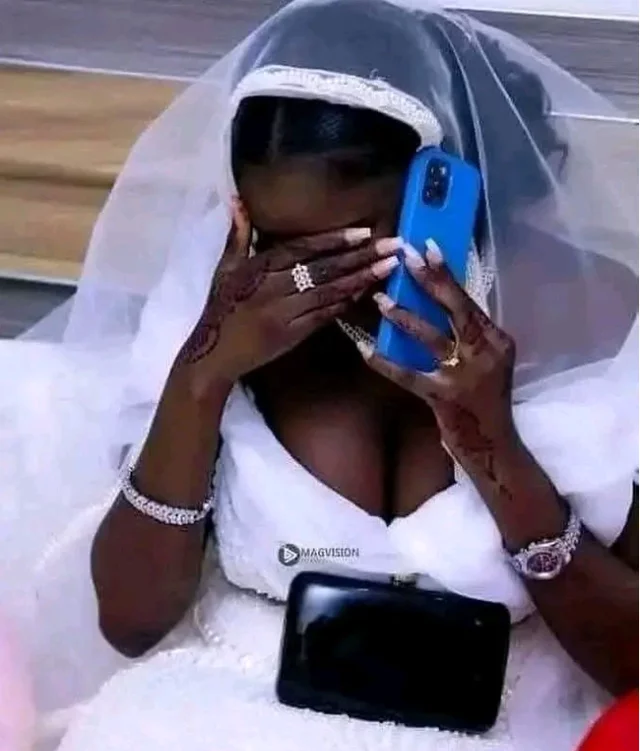 Shock as recently married lady in colourful wedding caught red handed in act